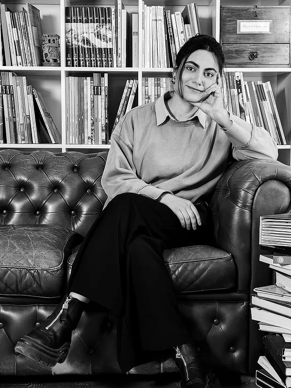 asmita-banyal-team-g4-group-architects-barcelona Architect on g4 group architecture sitting on sofa